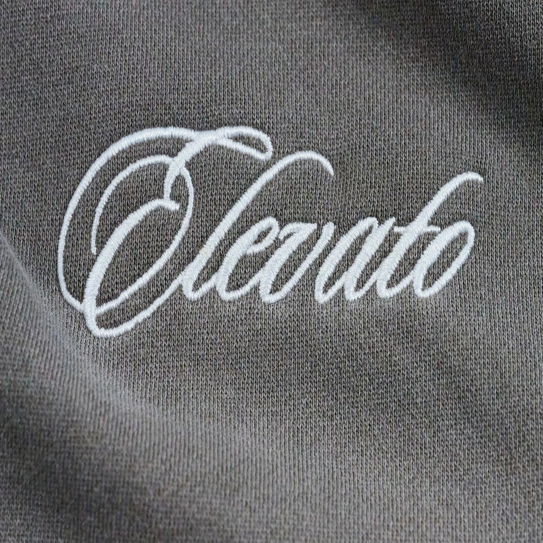 Elevato cursive logo font displayed on the left chest of the hoodie