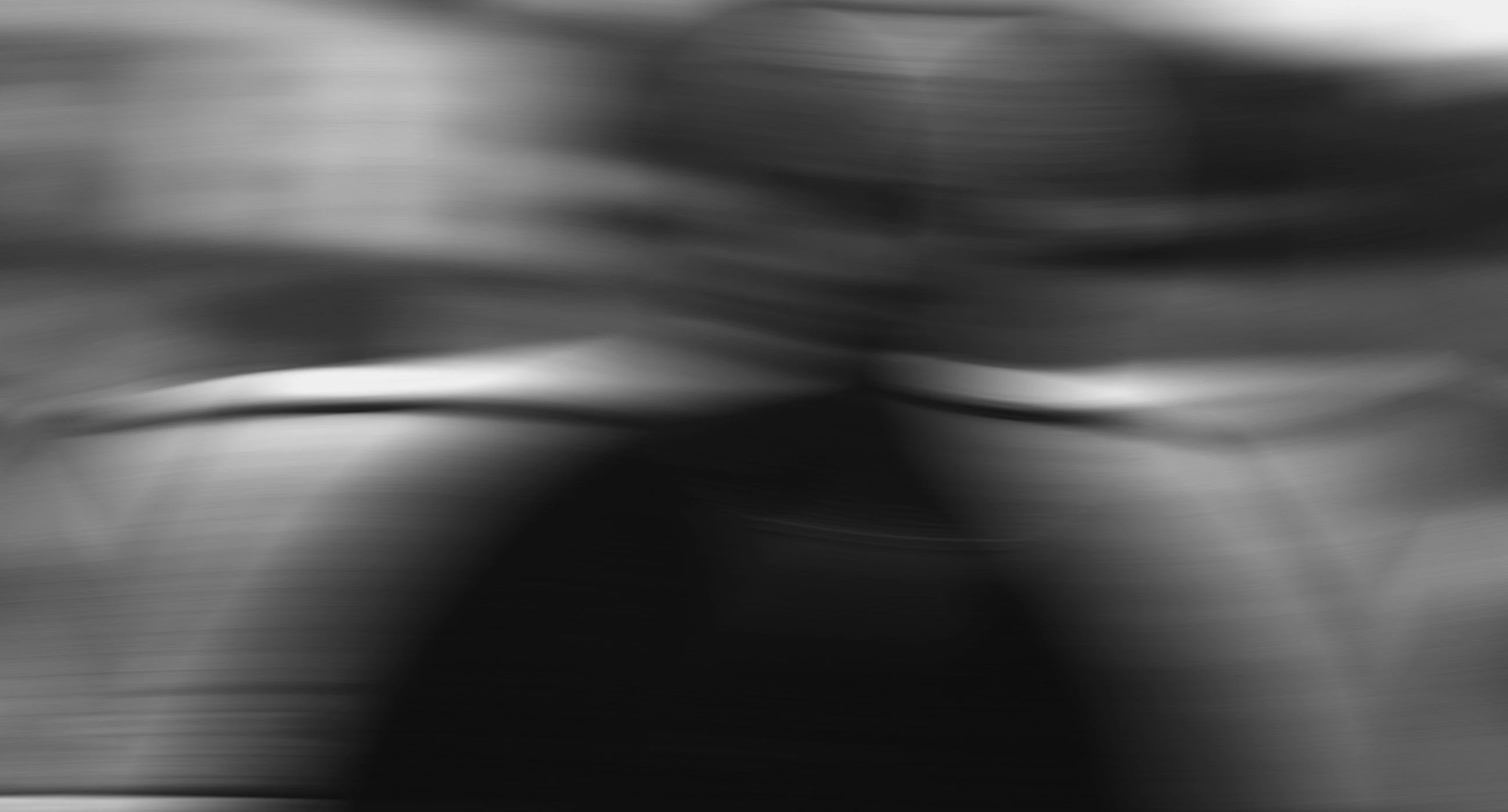 A blurry black and white design