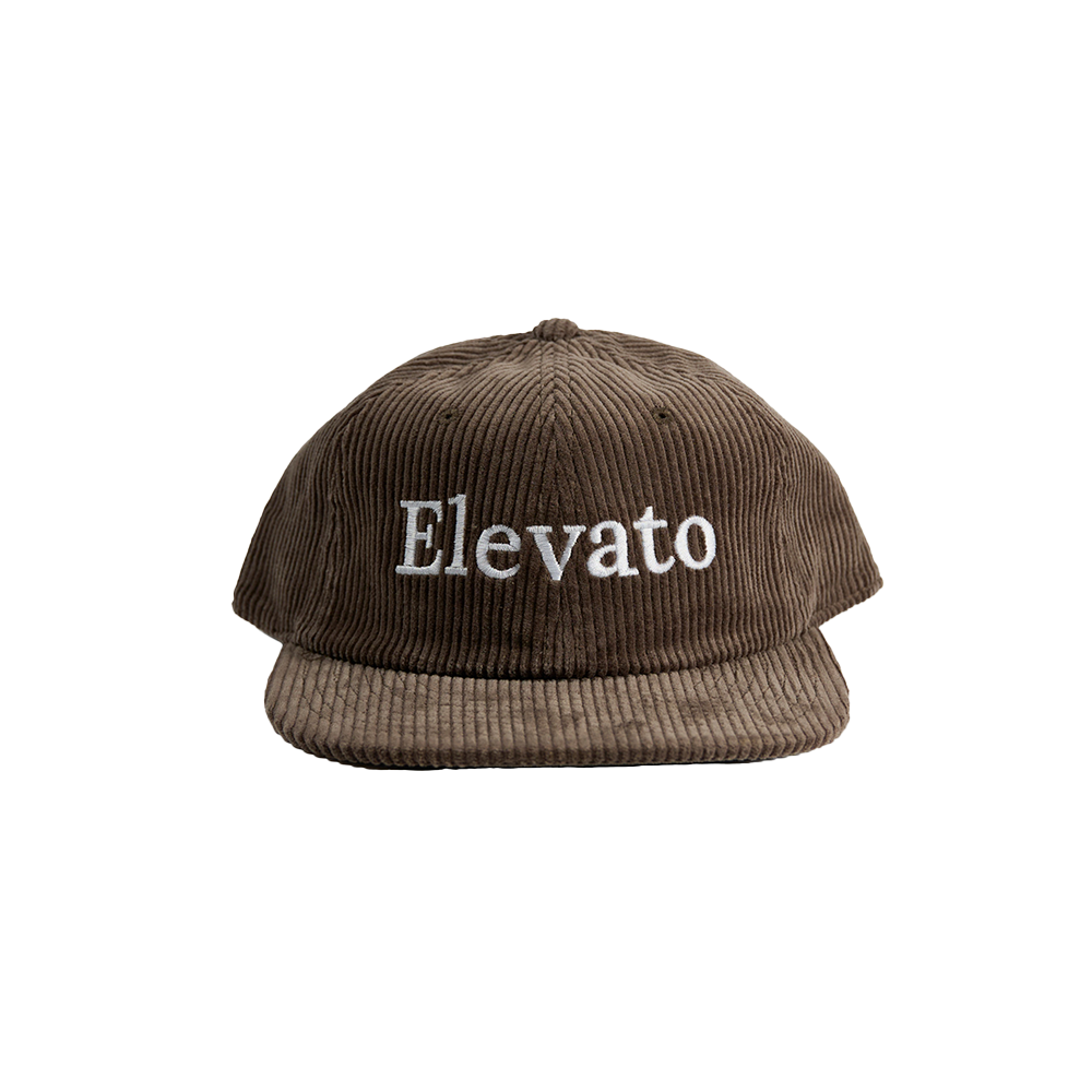 A brown hat with the Elevato logo prominently displayed on the front